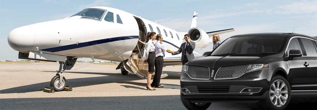 Passengers boarding a private jet beside a black luxury car